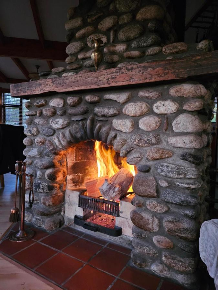Photo of property: cosy open fireplace